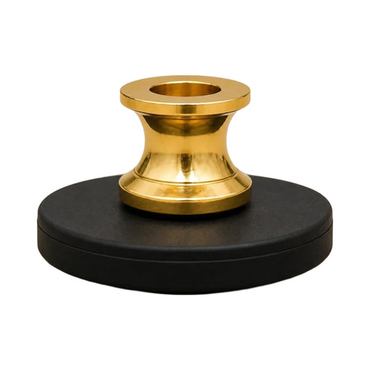 Magnetic display base with brass post on white background